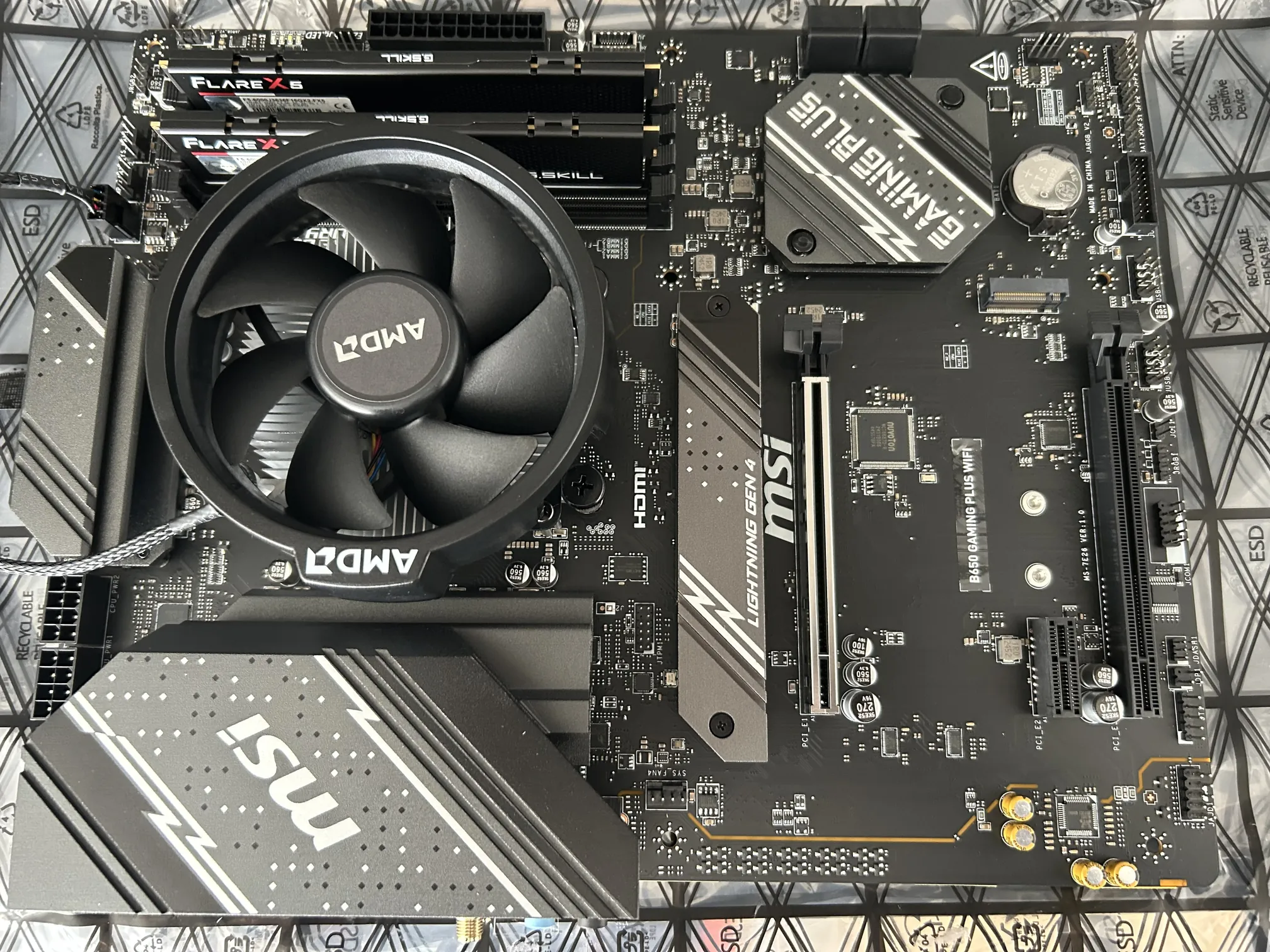 Motherboard with cover plate reinstalled